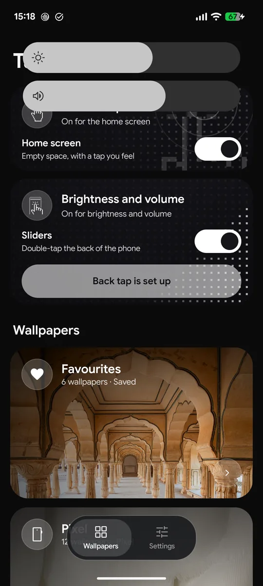 Brightness and volume sliders grown out of the camera over TapOff